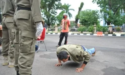 Tak Pakai Masker di Jambi? Bakal Kena Hukum Push-up dan Nyanyi