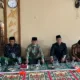 Wagub Abdullah Sani bersama Bupati Merangin Mashuri saat menghadiri peringatan Isra Mi'raj di Desa Pulau Bayur. (DETAIL/Daryanto)