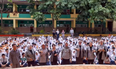 KAP Provinsi Jambi berfoto bersama Siswa/I SMPN 7 Kota Jambi usai kegiatan. (DETAIL/Juan)