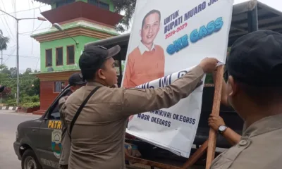 Baliho Asnawi diturunkan Satpol PP Muarojambi. (Dok. Asnawi)