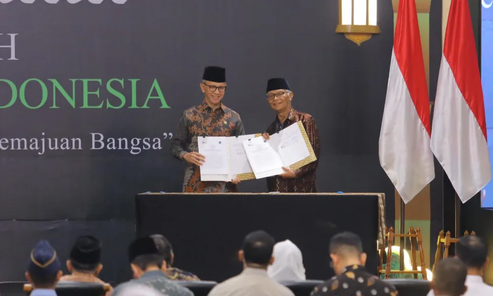 OJK dan MUI tandatangani kerjasama terkait keuangan syariah.
