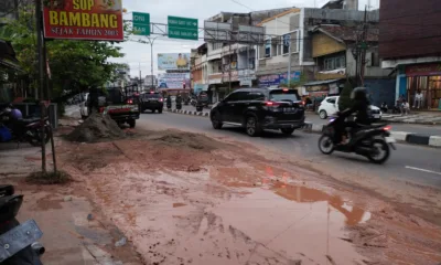 Kondisi jalan Gatot Subroto, Pasar, Kota Jambi setelah pipa yang diperbaiki. (DETAIL/Jorgi)
