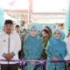 Bupati H. Anwar Sadat didampingi Ketua TP PKK, Hj. Fadhilah Sadat menggunting pita pada peresmian gedung baru Sekretariat Tim Penggerak PKK. (ist)