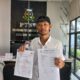 Ludwig Syarif (Delegasi DPP GMNI) saat menyerahkan Laporan ke Kejati Jambi. (ist)