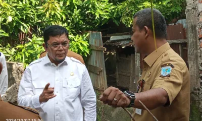 Ivan Wirata di salah satu titik rawan banjir belakang JBC. (DETAIL/Juan)