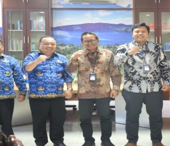 Pihak KPPU Kanwil I Sumbagut berfoto bersama dengan pihak BPS Sumut. (ist)