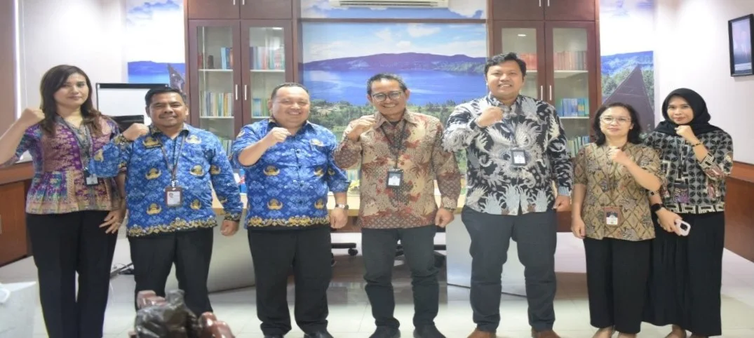 Pihak KPPU Kanwil I Sumbagut berfoto bersama dengan pihak BPS Sumut. (ist)